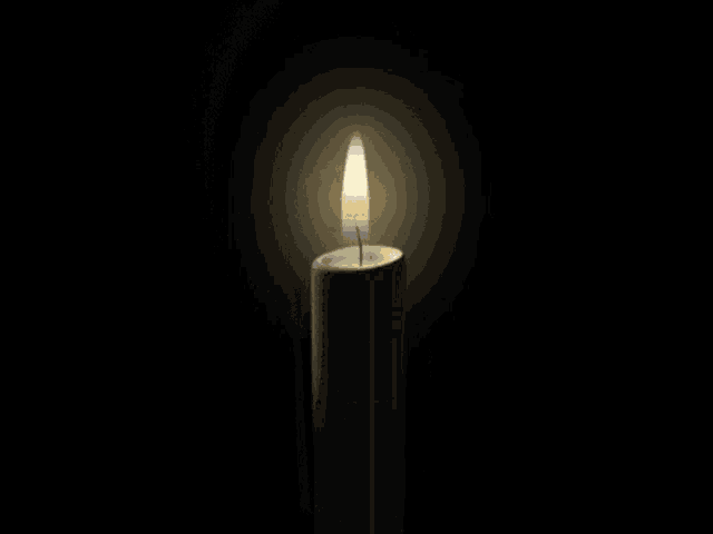 a candle with a picture of a girl on it that says ' sumire '