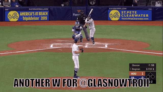 a man wearing a rays jersey is standing on the field