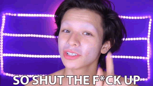 a man with makeup on his face and the words so shut the f * ck up