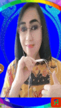 a woman wearing glasses is giving a thumbs up sign