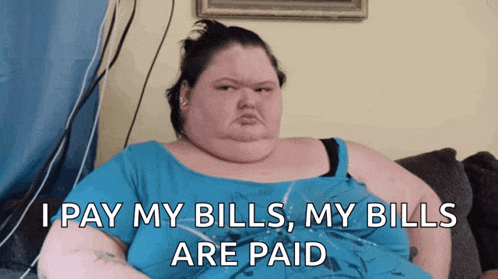 a very fat woman sits on a couch and says " i pay my bills "