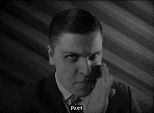 a man in a suit and tie is saying that he 'll let you in on a secret