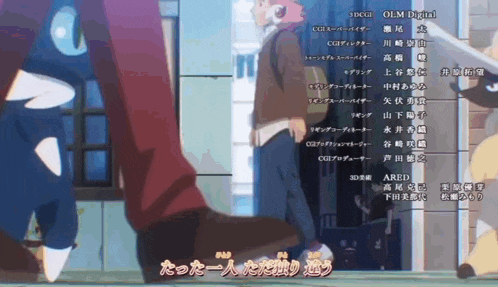 a person is walking down a sidewalk with chinese writing on the bottom