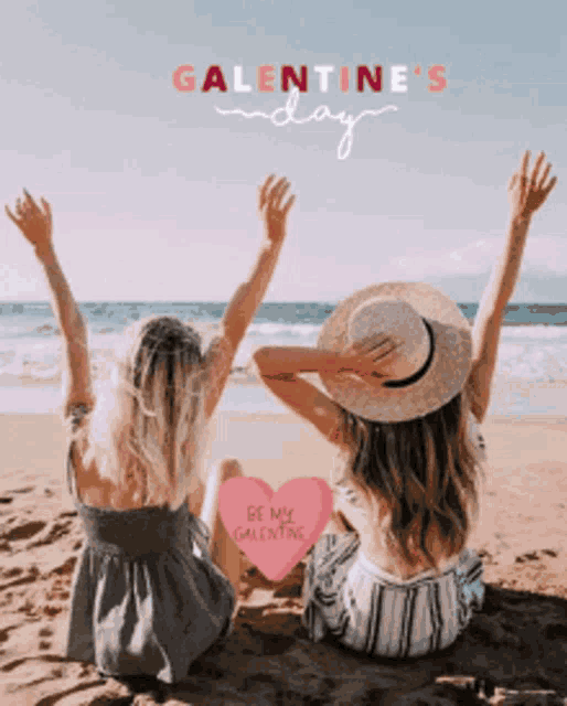 two women are sitting on the beach with their arms in the air and a heart that says be my galentine
