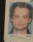 a close up of a man 's face on a passport