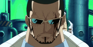 a man with a beard and sunglasses looks at the camera with a green background