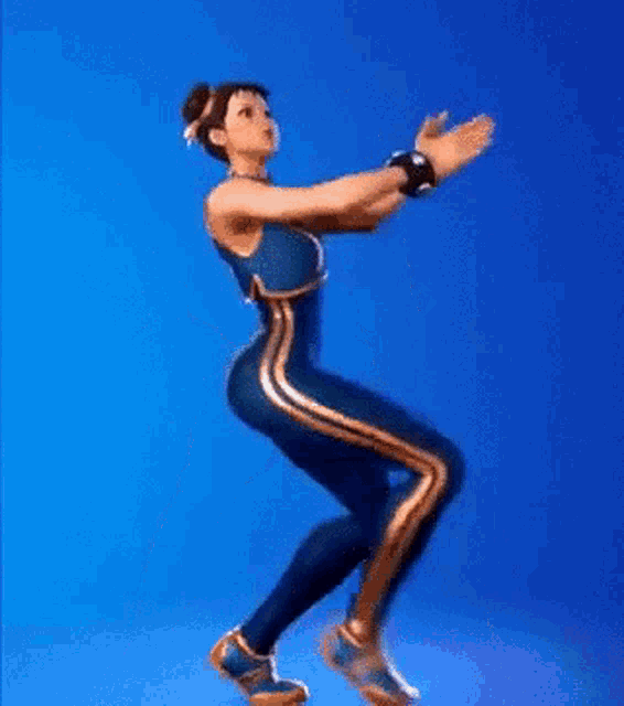 a woman in a blue costume is standing with her arms outstretched against a blue background .