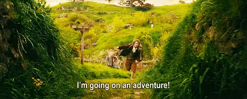 a man running through a grassy field with the words i 'm going on an adventure
