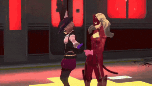 a woman in a cat mask is standing next to another woman in a costume