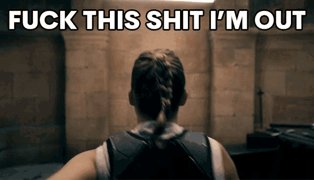 a woman 's back is shown with the words " fuck this shit i 'm out " behind her