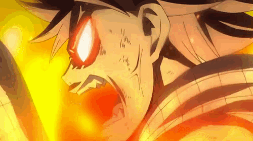 a close up of a man 's face with red eyes