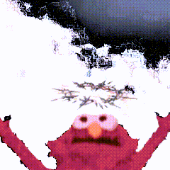 elmo from sesame street is standing in front of a snowy mountain