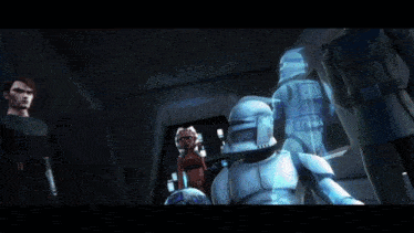 a group of star wars characters are standing around a clone trooper