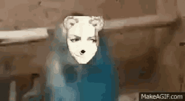 a drawing of a woman 's face with a bear 's head on it