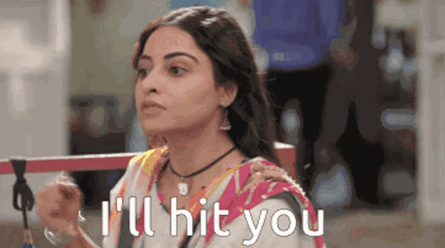 a woman says i 'll hit you while sitting down