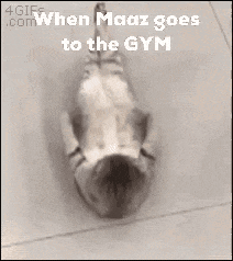 a black and white photo of a person laying on their back with the caption when maaz goes to the gym