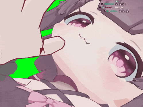 a close up of a girl 's face with a green screen behind it