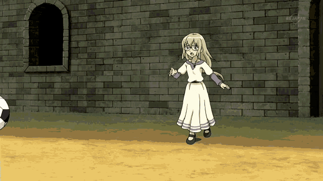 a girl in a white dress is playing with a soccer ball