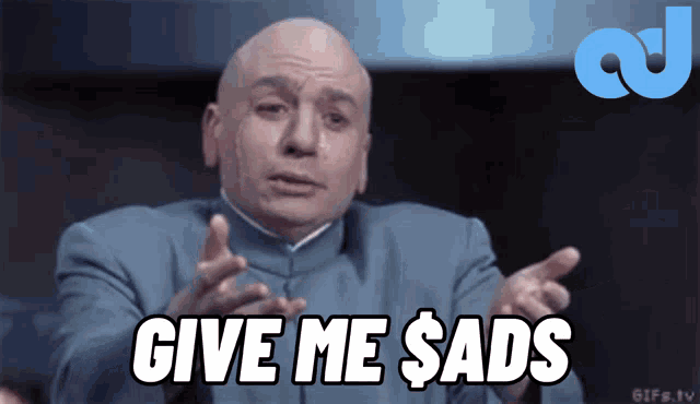 a bald man in a blue suit says give me dollars
