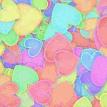 a bunch of colorful hearts are stacked together