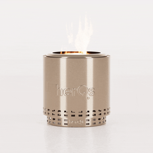 a stainless steel candle holder with the word herqs on it