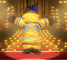 a cartoon character is wrapped in yarn and is standing on a stage