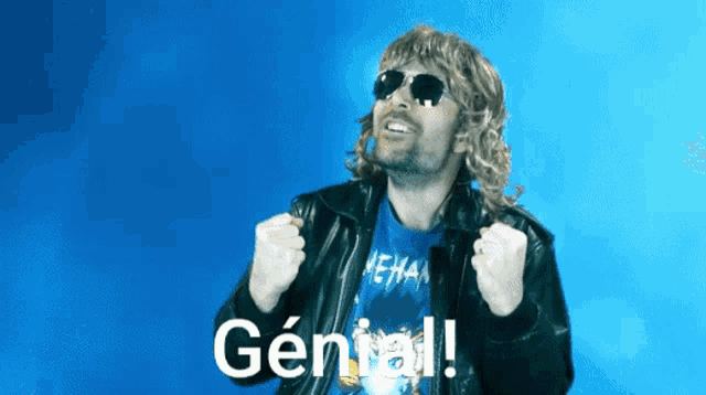 a man wearing sunglasses and a blue shirt with the word general written on it