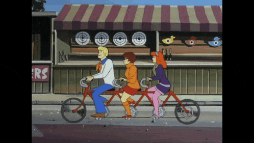 scooby doo and his friends ride a tandem bicycle