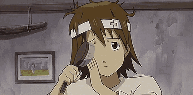 a cartoon character with a bandage on his head brushes his hair