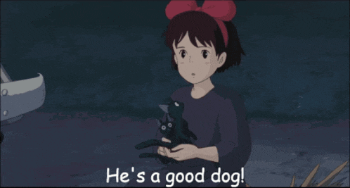 a girl holding a black cat with the words he 's a good dog