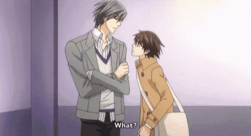 two anime characters are standing next to each other and talking to each other .