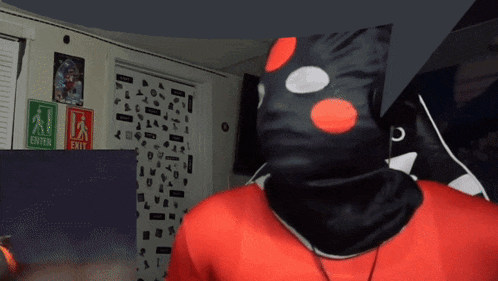 a person wearing a mask with a sign that says enter and exit