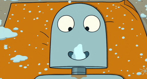 a cartoon character is laying on an orange blanket with snow falling