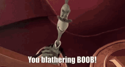 a cartoon character with a mustache and top hat is saying `` you blathering boob ! ''