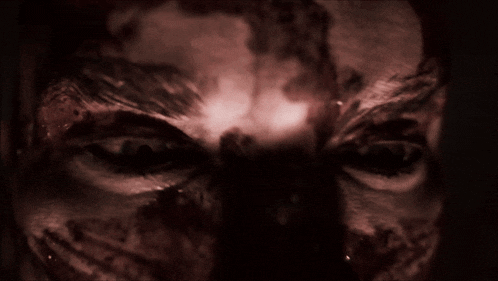 a close up of a person 's eye with a lot of blood on it