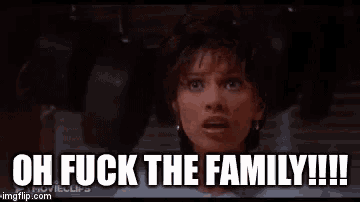 a woman is holding a piece of paper and says oh fuck the family !!!