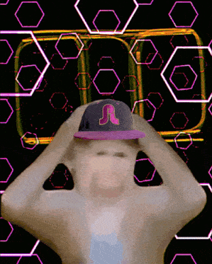 a man wearing a purple hat with a letter r on it