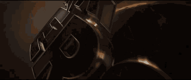a close up of a transformers logo on a dark background