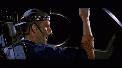 a man in a helmet says sweet jesus in a dark room