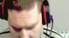 a pixelated image of a person wearing headphones and a microphone