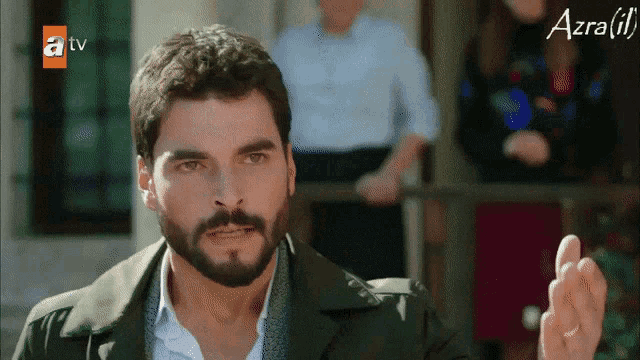 a man with a beard is on a tv show called azra ( ii )