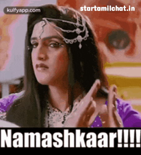 a woman in a purple dress says namashkaar