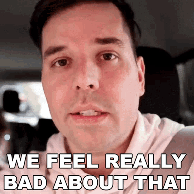 a man in a car with the words we feel really bad about that above him