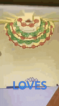 a picture of a cake with the word loves under it