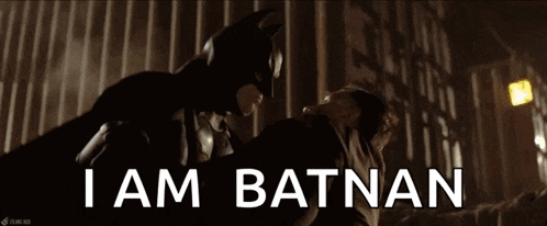 a man in a batman mask says i am batnan