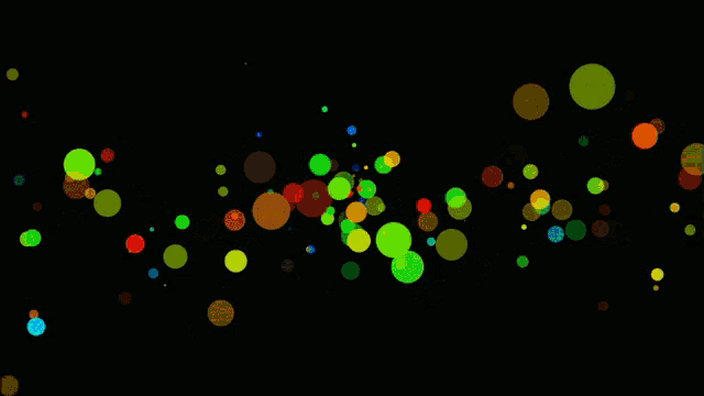 a bunch of colorful circles are floating in the air