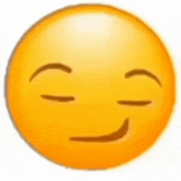 a close up of a smiley face with a wink on its eye .