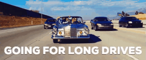 a group of cars are driving down a highway with the words " going for long drives " on the bottom