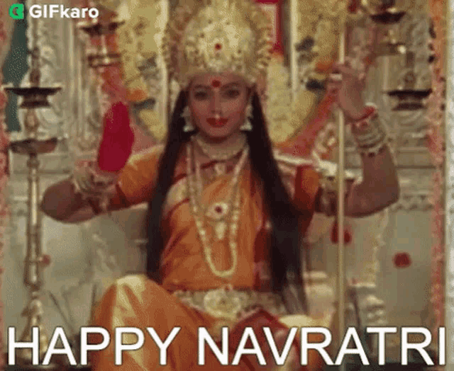 a woman in a costume is sitting on a throne with the words happy navratri written below her