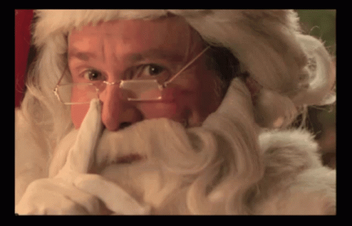 Jim Carrey Santa GIF - Jim Carrey Santa Raise Eye Brows GIFs